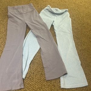 2 bell bottom styled leggings. Purple is art class sz 7-8 and blue athleta sz7
